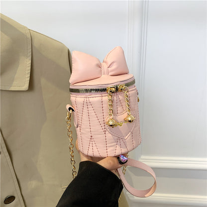 Mini sac à bandoulière cylindrique tendance et mignon avec fermeture éclair et nœud papillon de couleur unie 