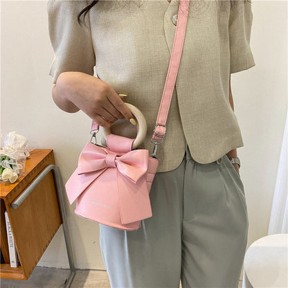 Sac à bandoulière en PU avec nœud de couleur unie pour femme 