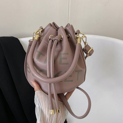 Sac seau à cordon de serrage en PU pour femme 