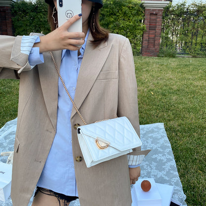 Sac à bandoulière en PU de couleur unie avec boucle à rabat pour femme 