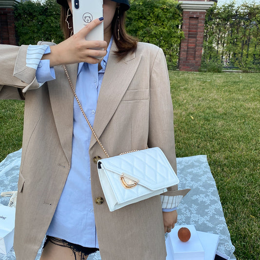 Sac à bandoulière en PU de couleur unie avec boucle à rabat pour femme 