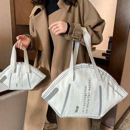 Sac à bandoulière en toile de grande capacité pour femme, motif de lettres, créatif et amusant, en forme de masque 