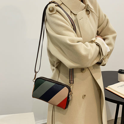 Sac à bandoulière décontracté en PU à rayures et fermeture éclair pour femme 