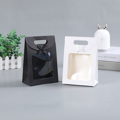 Sac cadeau transparent à rabat avec nœud créatif et simple 
