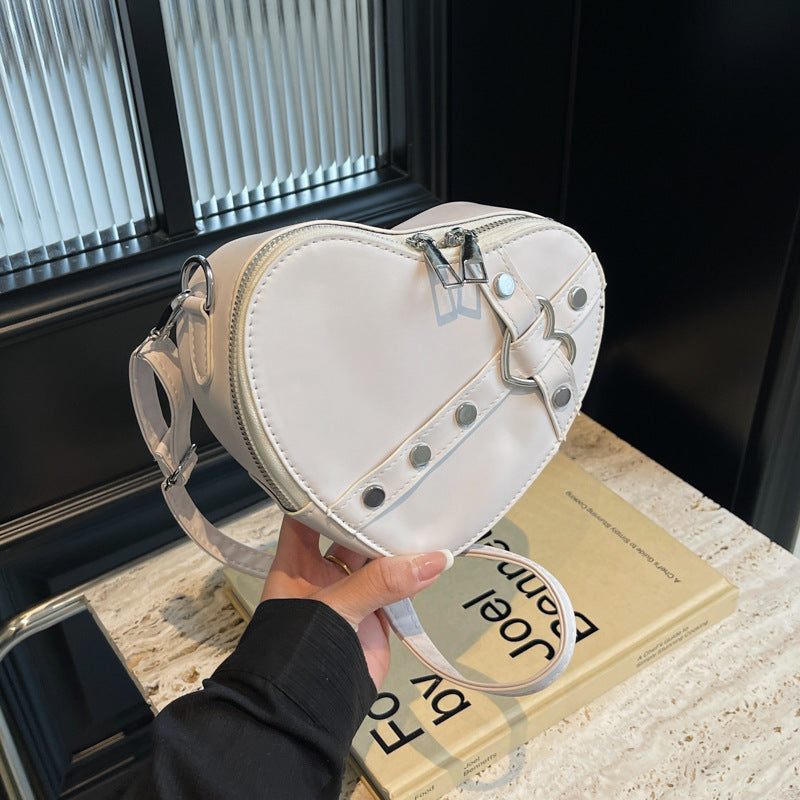 Sac à bandoulière en PU avec fermeture éclair en forme de cœur pour femme 