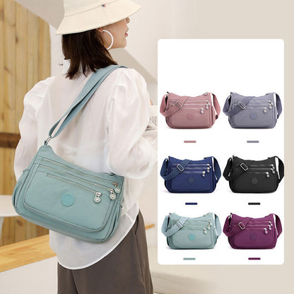 Sac à bandoulière décontracté à poches multiples pour femme, fermeture éclair, couleur unie, grande capacité 