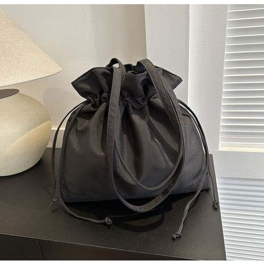 Sac à bandoulière tendance pour femme avec cordon de serrage 