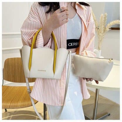 Women Fashion Solid Color Wavy Edge PU Handle Shoulder Bag