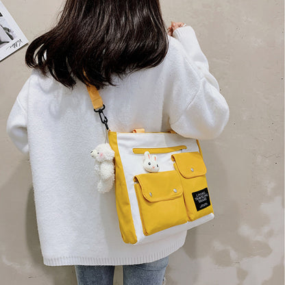 Women Cute Cartoon Doll Decoration Pocket Design Color Blocking Canvas Shoulder Bag