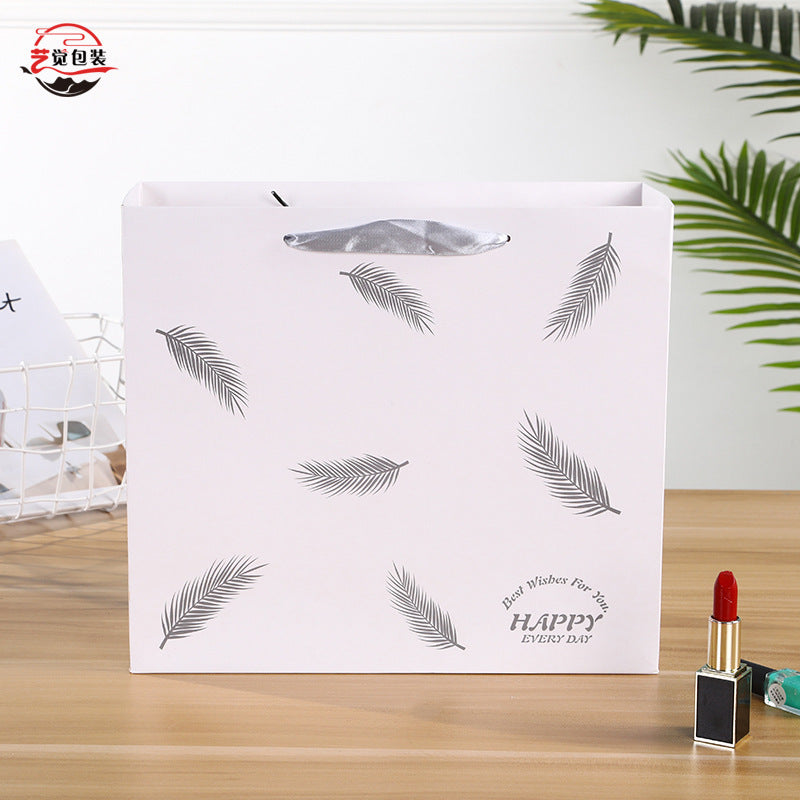 Sac en papier imprimé plumes tendance 