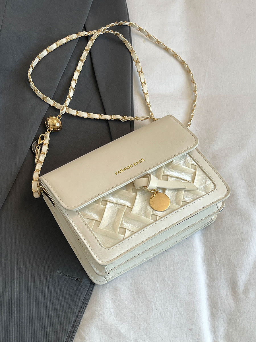 Sac à bandoulière carré au design tendance 