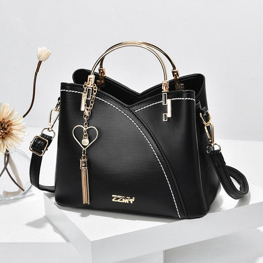 Women Fashionable Large Capacity Square Hollow Heart-Shaped Pendant Color-Matching PU Handle Shoulder Bag