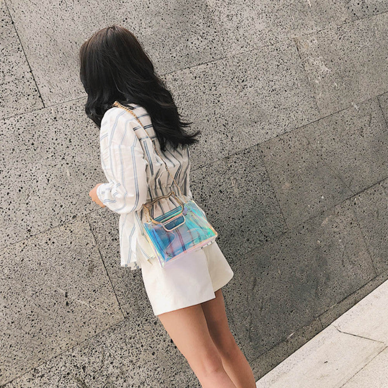 Sac à bandoulière en PVC avec poignée en forme d'oreilles de chat et design laser créatif pour femme 