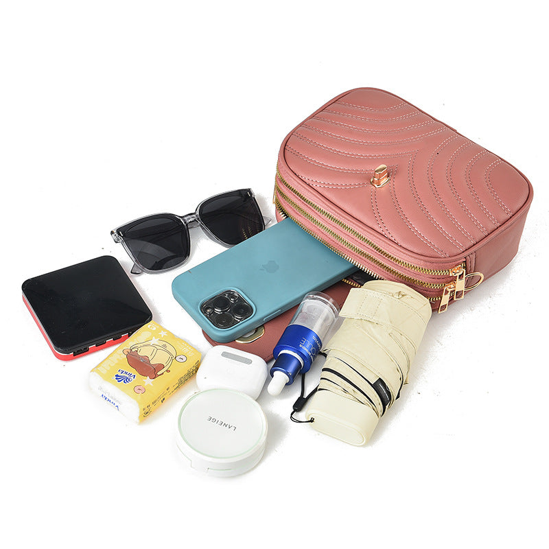 Sac à bandoulière en PU à trois couches avec fermeture éclair et broderie à rayures de couleur unie pour femme 