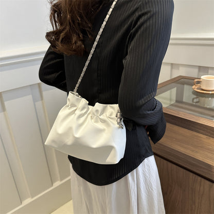 Sac à bandoulière magnétique en PU pour femme, couleur unie, tendance