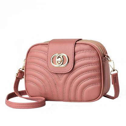 Sac à bandoulière en PU à trois couches avec fermeture éclair et broderie à rayures de couleur unie pour femme 