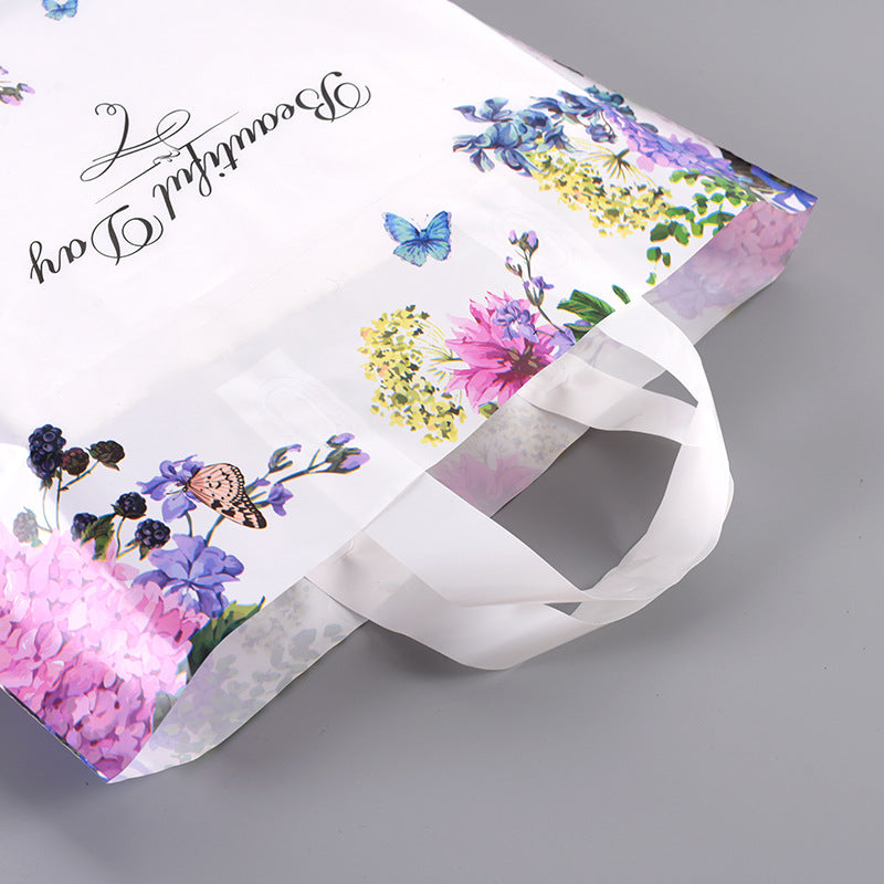 Sac fourre-tout en plastique à imprimé floral et papillon simple 