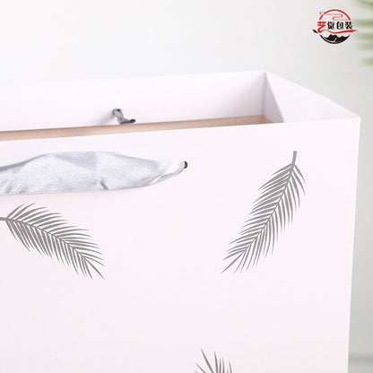 Sac en papier imprimé plumes tendance 