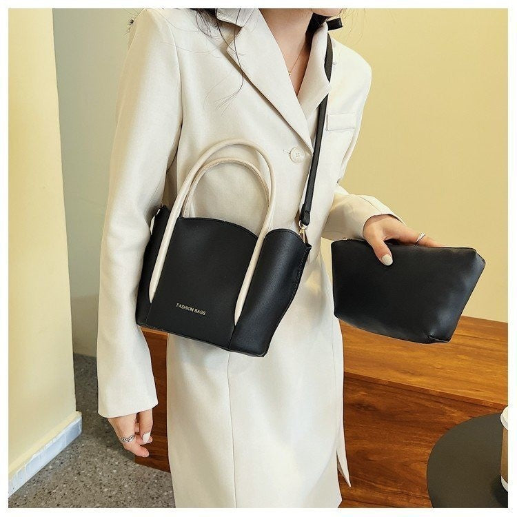 Women Fashion Solid Color Wavy Edge PU Handle Shoulder Bag