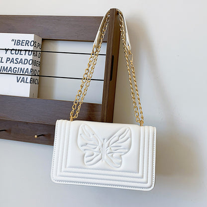 Sac à bandoulière carré tendance en relief avec motif papillon de couleur unie 