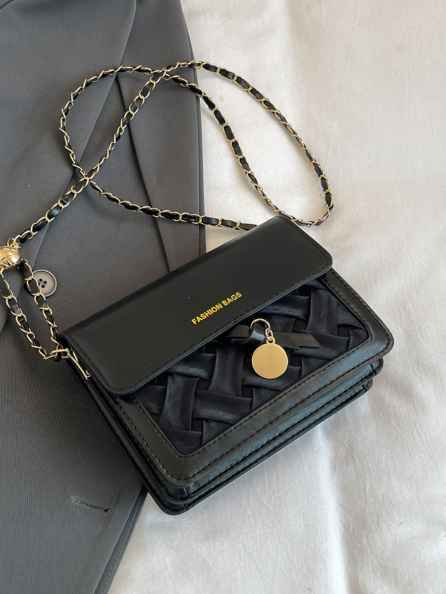 Sac à bandoulière carré au design tendance 