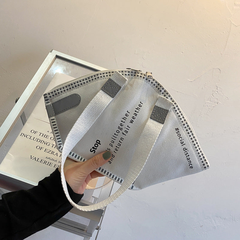 Sac à bandoulière en toile de grande capacité pour femme, motif de lettres, créatif et amusant, en forme de masque 