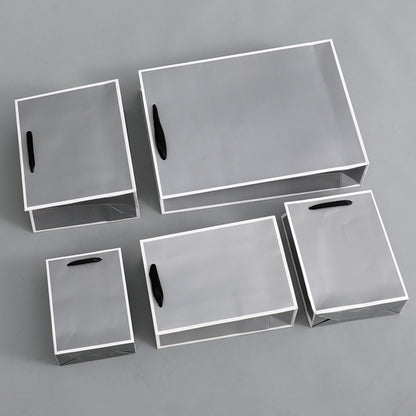 Sac d'emballage en papier gris argenté, simple et portable 