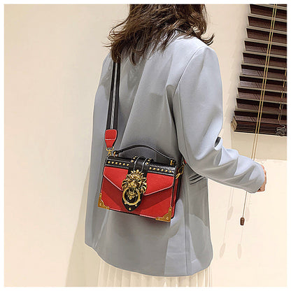 Sac à bandoulière en PU pour femme, décontracté, couleur unie, avec rivets en forme de tête de lion 