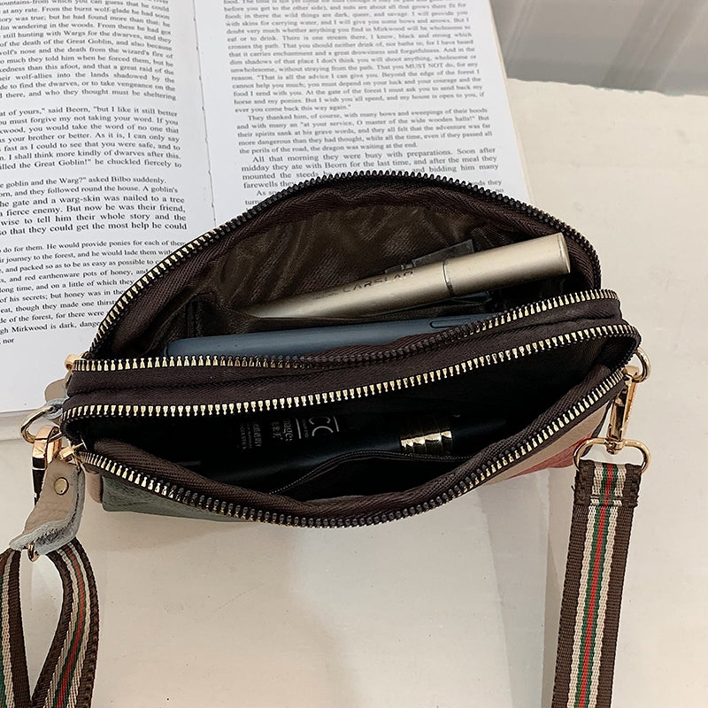 Sac à bandoulière décontracté en PU à rayures et fermeture éclair pour femme 