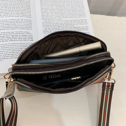 Sac à bandoulière décontracté en PU à rayures et fermeture éclair pour femme 