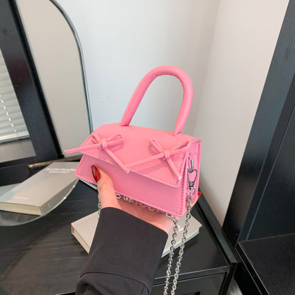 Mini sac bandoulière tendance à chaîne et nœud de couleur unie 