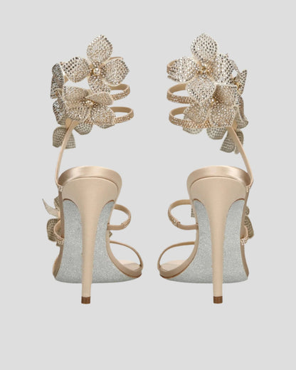 Elisa Flower Embellished Snake Sandals In Gold